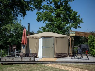 outside of the yurt at back of beyond glamping in dorset