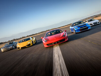 five supercars on a race track at car chase heroes driving experience day