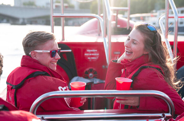 passengers enjoying a thames rocket speedboat experience in london