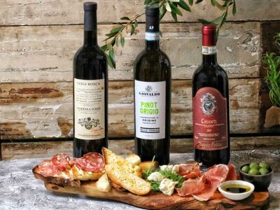 3 bottles of red wine with a sharing platter of meats, bread and cheese for a wine and nibbles gift experience