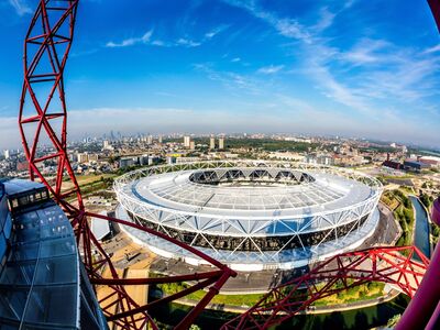 view over the london stadium and surrounding london skyline from the top of the arcelormittal orbit