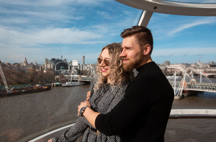 couple in london eye pod as part of london break with river cruise